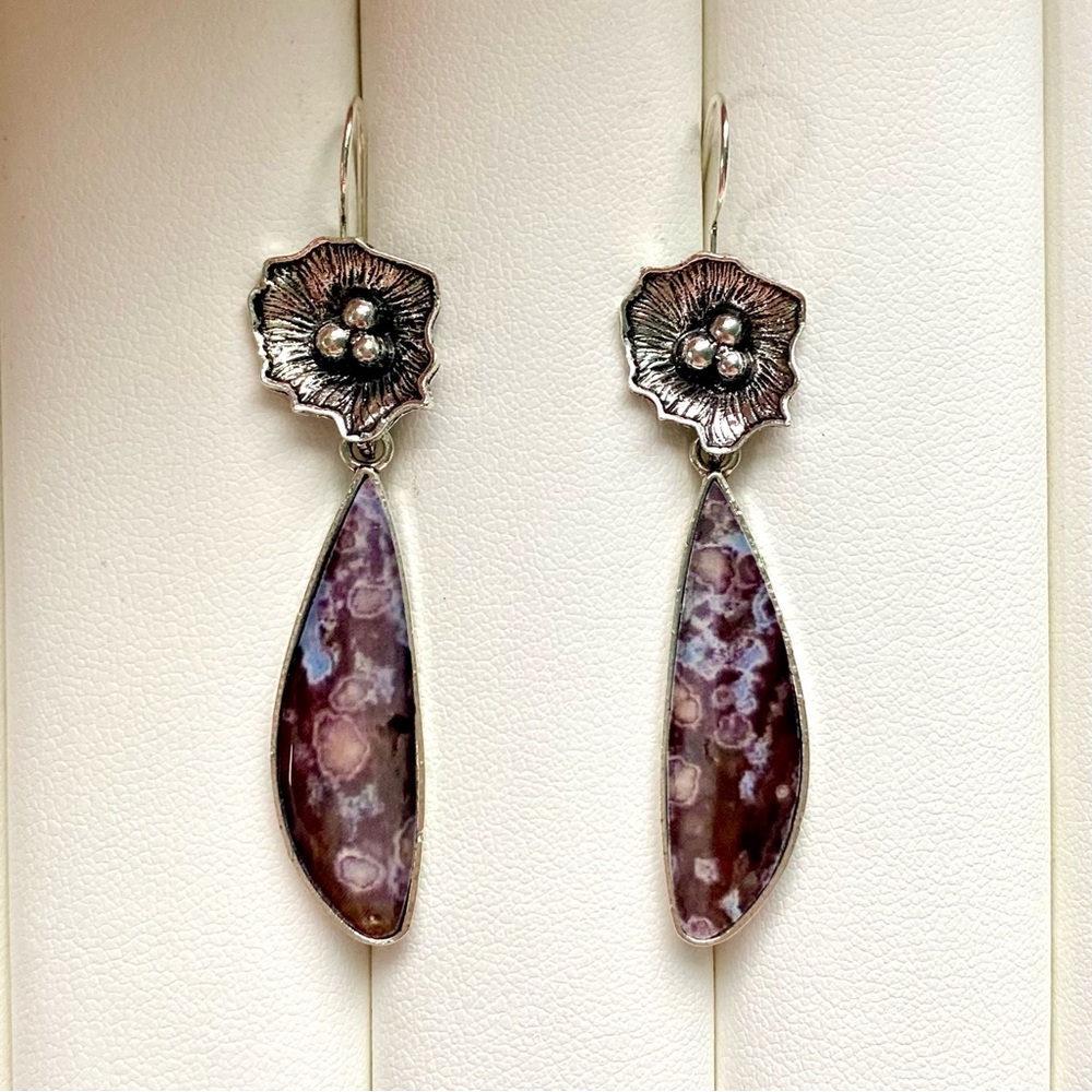 Purple and brown floral earrings with silver accents